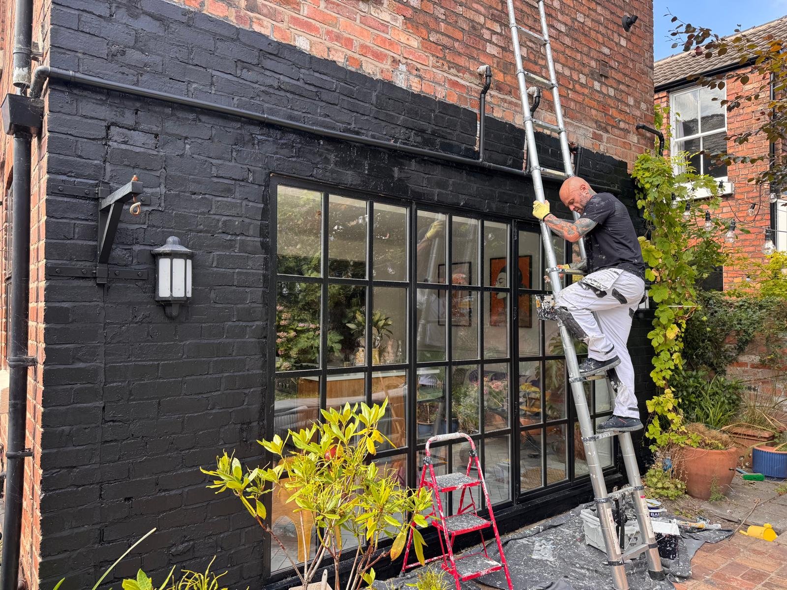 Painted black brick exterior